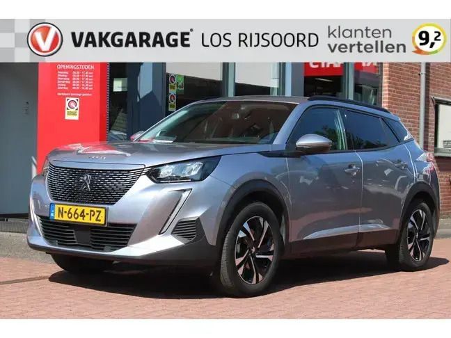 Grijs Gebruikt 2021 Peugeot e-2008 Allure SUV | € 15.500 (Goede deal) - Afbeelding 1/4