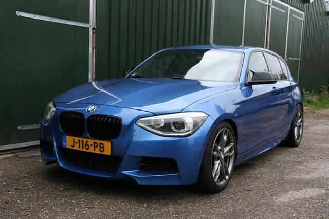 Blauw Gebruikt 2012 BMW M135 M Sport Hatchback | € 18.950 (Eerlijke prijs) - Afbeelding 1/4