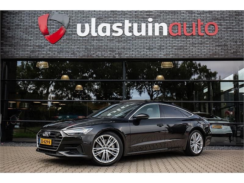 Grijs Gebruikt 2018 Audi A7 Proline Hatchback | € 36.950 (Goede deal) - Afbeelding 1/4