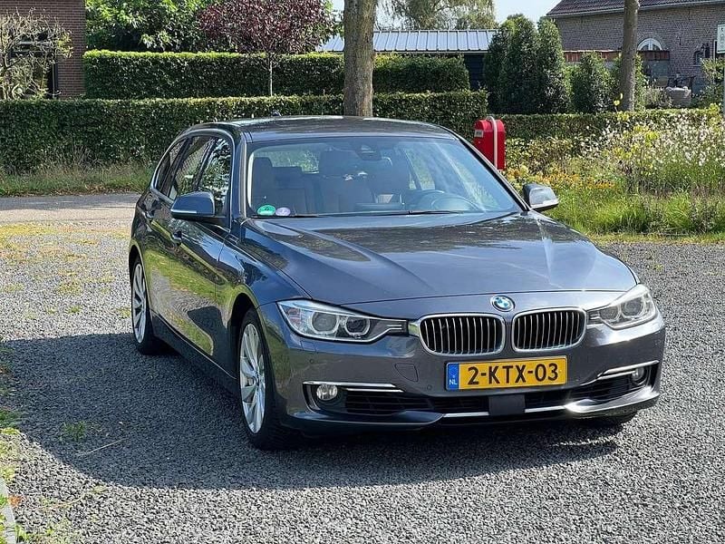 Grijs Gebruikt 2013 BMW 335 Executive Stationwagen | € 15.750 (Super prijs) - Afbeelding 1/4