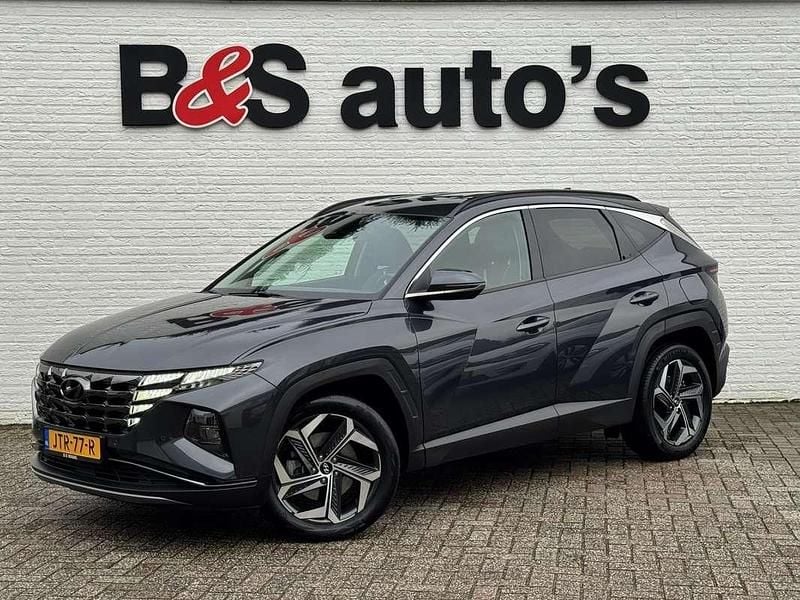 Grijs Occasion 2021 Hyundai Tucson SUV | € 27.700 (Eerlijke prijs) - Afbeelding 1/4