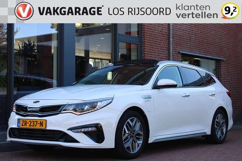 Wit Gebruikt 2019 Kia Optima Hybrid Sedan | € 20.500 (Eerlijke prijs) - Afbeelding 1/4