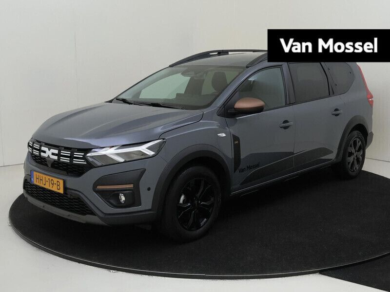 Grijs Gebruikt 2025 Dacia Jogger Extreme MPV | € 33.435 (Duur) - Afbeelding 1/4