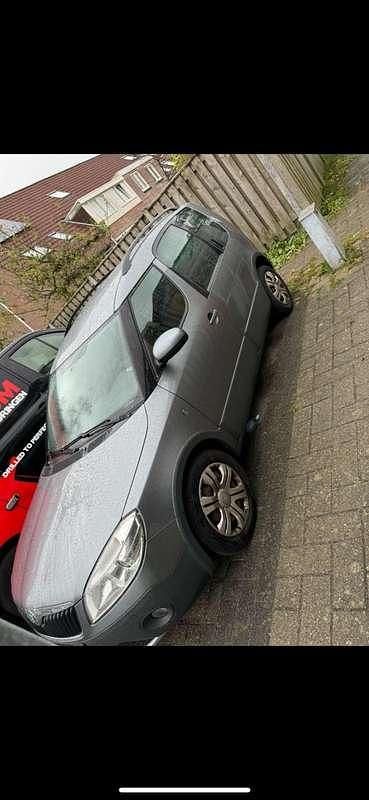 Occasion Skoda Octavia Ambition 105 PK (77 kW) 2011 Zwart Stationwagen