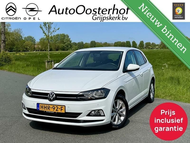 Wit Gebruikt 2021 VW Polo Hatchback | € 16.950 (Goede deal) - Afbeelding 1/4