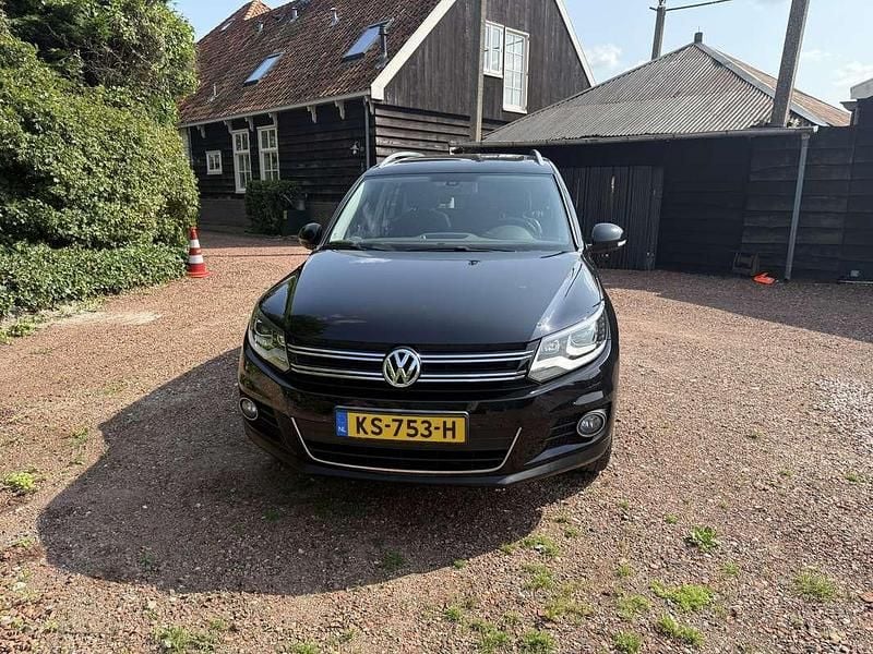 Zwart Gebruikt 2011 VW Tiguan Sport SUV | € 13.950 (Iets duurder) - Afbeelding 1/4