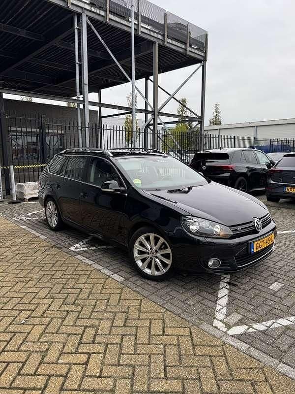 Zwart Gebruikt 2012 VW Golf VII Exclusive Stationwagen | € 8.250 (Eerlijke prijs) - Afbeelding 1/4