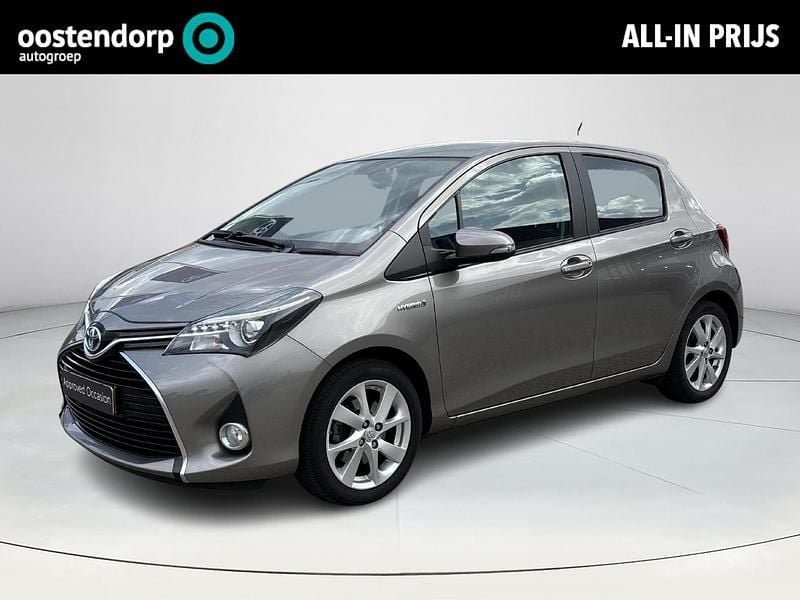 Bruin Gebruikt 2015 Toyota Yaris Hybrid Hatchback | € 14.000 (Eerlijke prijs) - Afbeelding 1/4