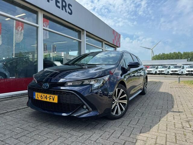 Blauw, metallic lak Gebruikt 2021 Toyota Corolla Business Edition Stationwagen | € 22.450 (Eerlijke prijs) - Afbeelding 1/4