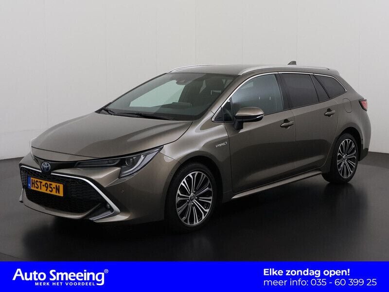 Bruin Gebruikt 2021 Toyota Corolla Executive Stationwagen | € 25.895 (Goede deal) - Afbeelding 1/4