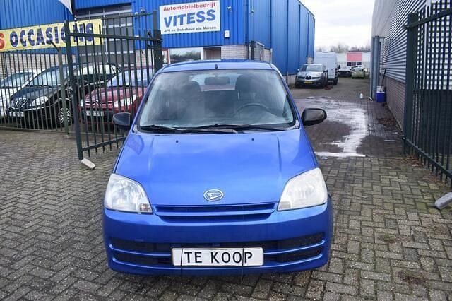Occasion Daihatsu Cuore 58 PK (42 kW) 2007 Blauw Hatchback