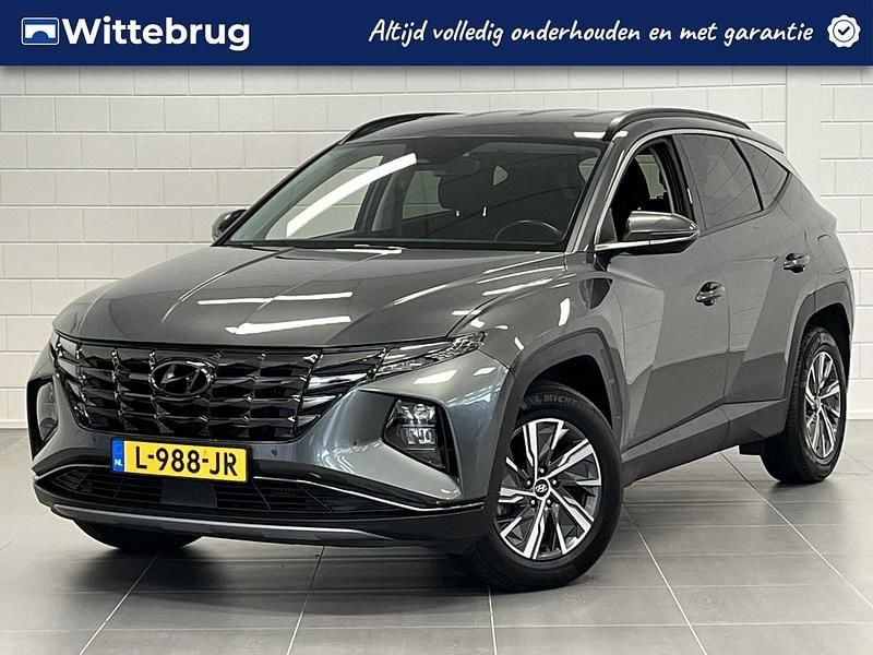 Grijs, metallic lak Gebruikt 2021 Hyundai Tucson Comfort SUV | € 29.925 (Eerlijke prijs) - Afbeelding 1/3