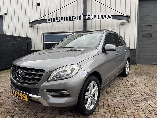 Grijs Gebruikt 2013 Mercedes 350 SUV | € 17.950 (Eerlijke prijs) - Afbeelding 1/4