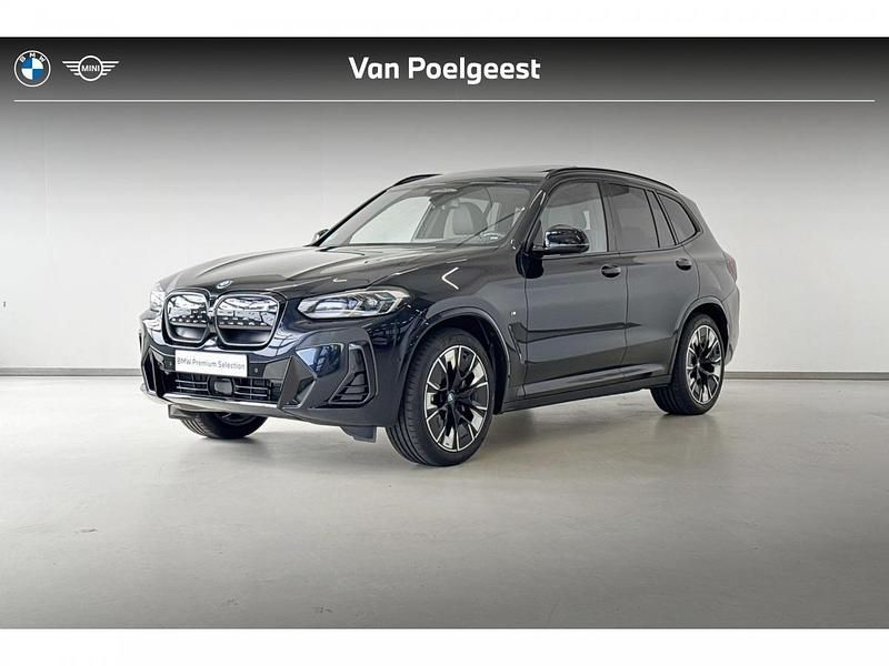 M carbonschwarz metallic (416) (zwart metallic) Gebruikt 2024 BMW iX3 Comfort Edition SUV | € 56.895 (Eerlijke prijs) - Afbeelding 1/4