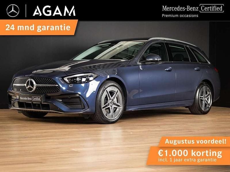Blauw, metallic lak Gebruikt 2024 Mercedes C300e AMG Line Premium Stationwagen | € 46.950 (Goede deal) - Afbeelding 1/4