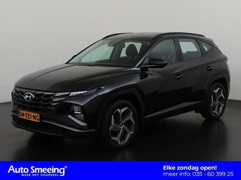 Phantom black pearl (pae) Gebruikt 2022 Hyundai Tucson Comfort SUV | € 28.895 (Super prijs) - Afbeelding 1/4