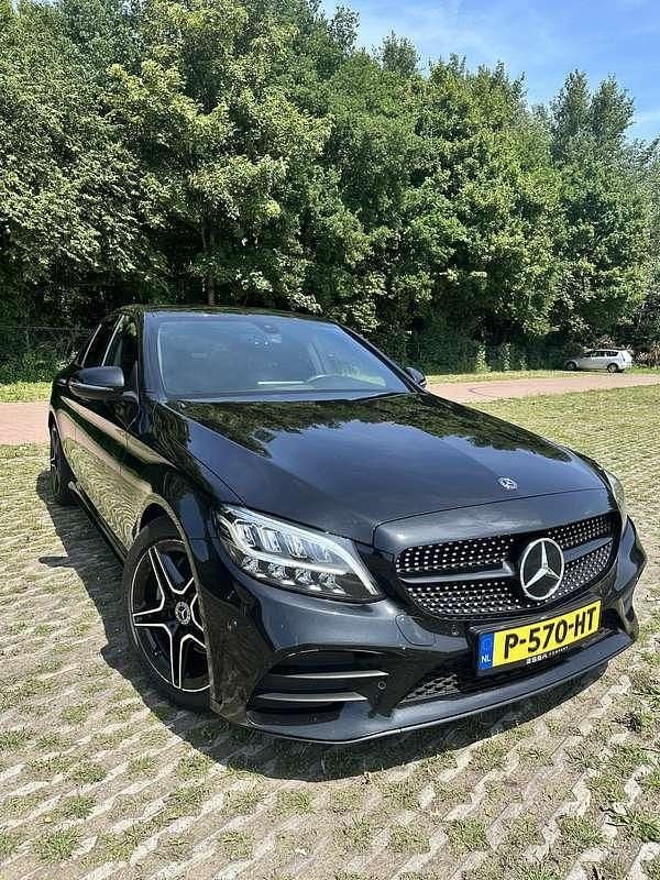 Zwart Gebruikt 2018 Mercedes C200 AMG Sedan | € 25.950 (Eerlijke prijs) - Afbeelding 1/4