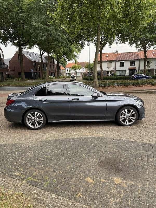Grijs Occasion 2015 Mercedes C200 Ambition Sedan | € 20.000 (Iets duurder) - Afbeelding 1/4