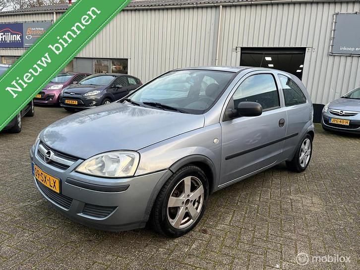 Grijs Gebruikt 2006 Opel Corsa Essentia Hatchback | € 1.190 (Eerlijke prijs) - Afbeelding 1/4