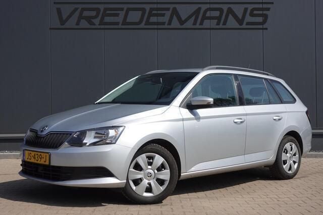 Grijs, metallic lak Gebruikt 2015 Skoda Fabia Ambition Stationwagen | € 6.450 (Goede deal) - Afbeelding 1/4