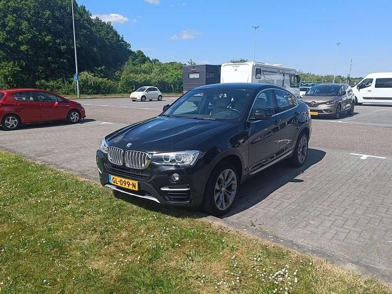 Zwart Gebruikt 2015 BMW X4 SUV | € 23.000 (Eerlijke prijs) - Afbeelding 1/4