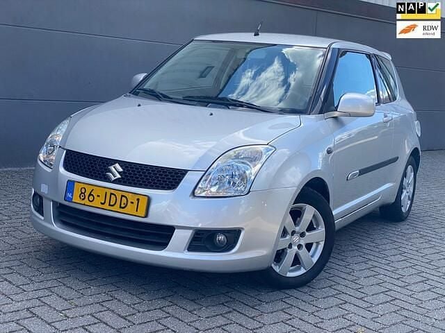Grijs Gebruikt 2009 Suzuki Swift Exclusive Hatchback | € 2.999 (Eerlijke prijs) - Afbeelding 1/4