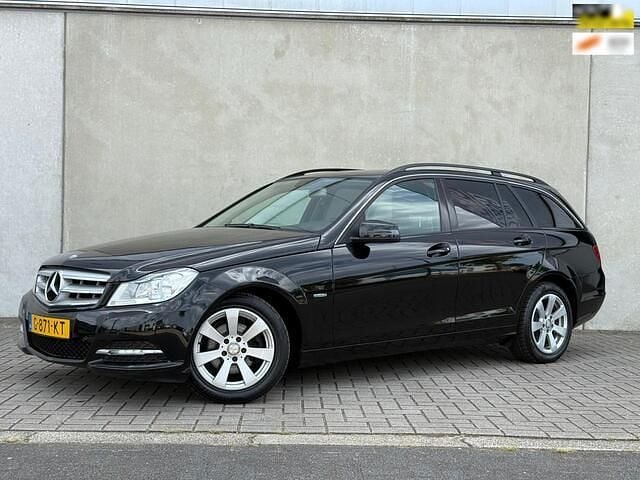 Occasion Mercedes C180 Elegance 157 PK (115 kW) 2011 Zwart, metallic lak Stationwagen