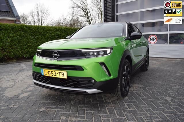 Groen Gebruikt 2021 Opel Mokka-e Ultimate SUV | € 16.995 (Eerlijke prijs) - Afbeelding 1/4