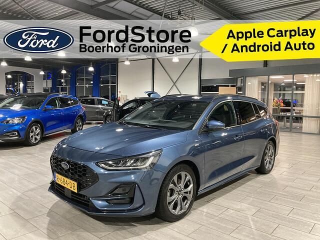 Blauw (metallic) Gebruikt 2022 Ford Focus ST-Line Stationwagen | € 18.890 (Eerlijke prijs) - Afbeelding 1/4