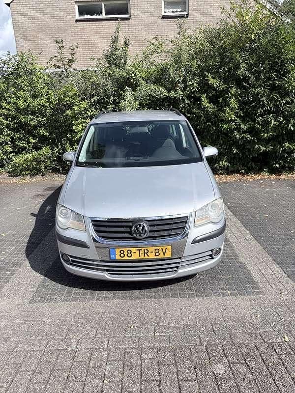 Grijs Occasion 2007 VW Touran MPV | € 3.700 (Eerlijke prijs) - Afbeelding 1/4