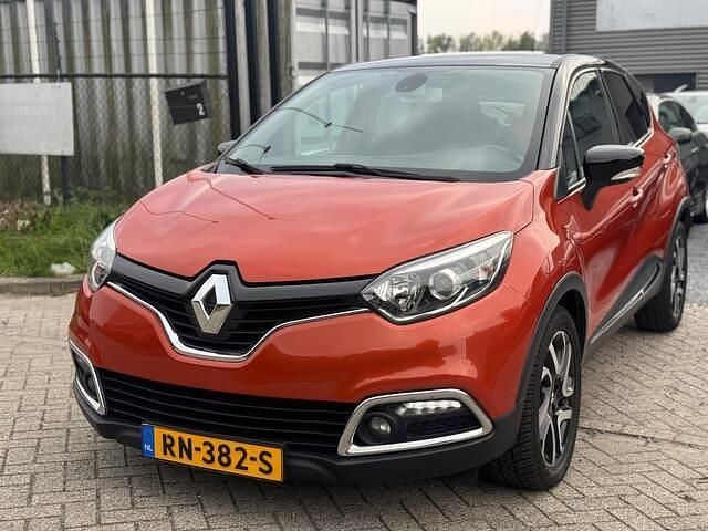 Oranje Gebruikt 2014 Renault Captur Dynamique SUV | € 5.950 (Goede deal) - Afbeelding 1/4