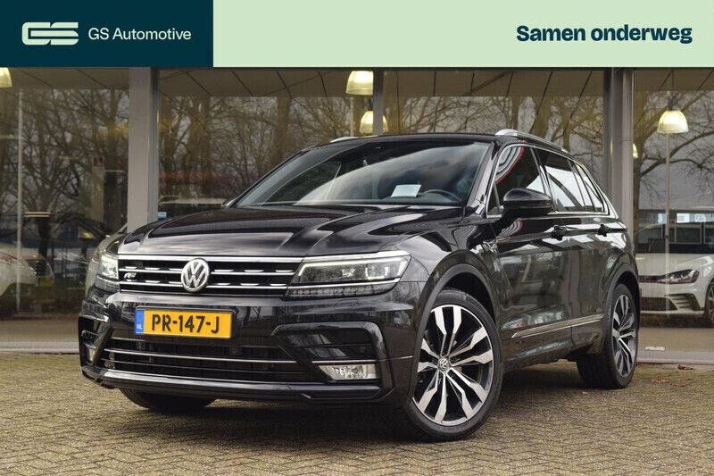 Zwart Gebruikt 2016 VW Tiguan R-line SUV | € 28.990 (Eerlijke prijs) - Afbeelding 1/3