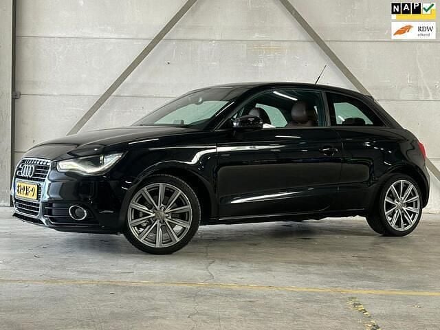 Zwart, metallic lak Gebruikt 2011 Audi A1 Ambition Hatchback | € 7.995 (Eerlijke prijs) - Afbeelding 1/4