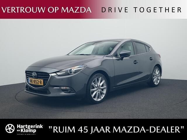 Machine gray Gebruikt 2017 Mazda 3 Hatchback | € 15.950 (Eerlijke prijs) - Afbeelding 1/4