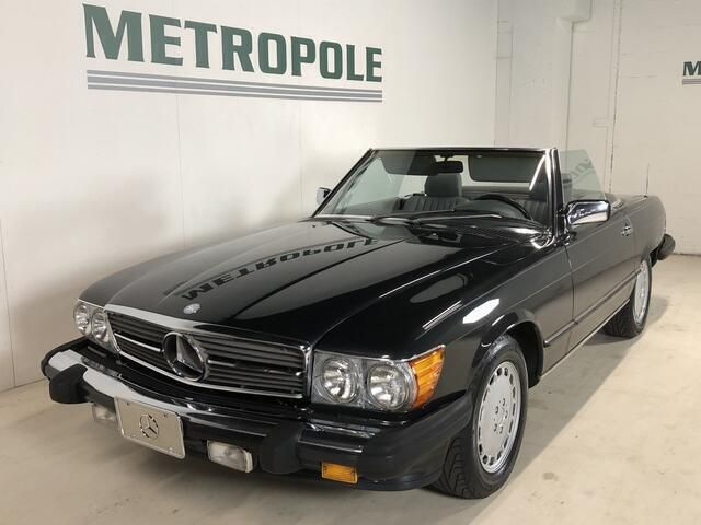 Zwart Gebruikt 1988 Mercedes 560 Cabriolet | € 30.000 - Afbeelding 1/4
