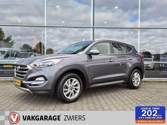 Grijs Gebruikt 2015 Hyundai Tucson Comfort SUV | € 12.490 (Eerlijke prijs) - Afbeelding 1/4