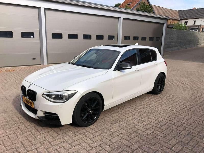 Wit Gebruikt 2011 BMW 118 Hatchback | € 10.999 - Afbeelding 1/4