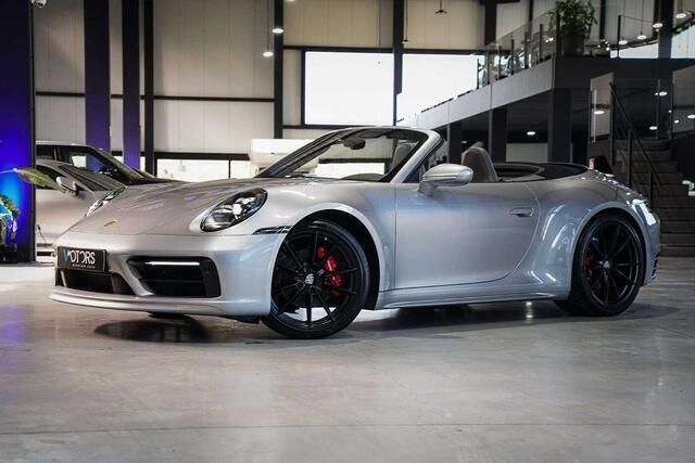 Zilver Gebruikt 2021 Porsche 911 Carrera 4 Cabriolet Cabriolet | € 124.995 - Afbeelding 1/4