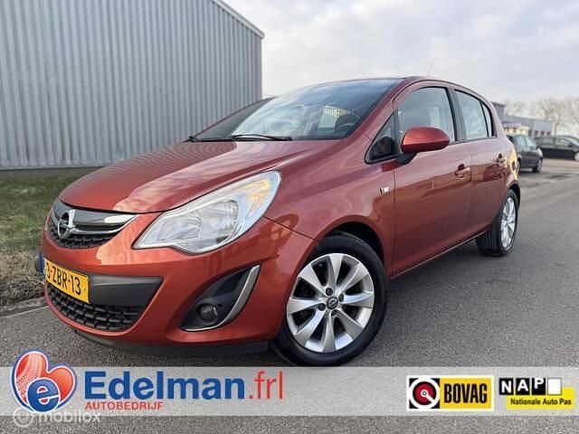 Oranje (metallic) Occasion 2013 Opel Corsa Edition Hatchback | € 4.500 (Goede deal) - Afbeelding 1/4