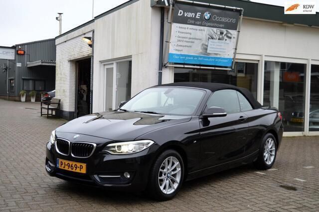 Zwart Gebruikt 2015 BMW 220 Sport Line Cabriolet | € 19.990 (Eerlijke prijs) - Afbeelding 1/4
