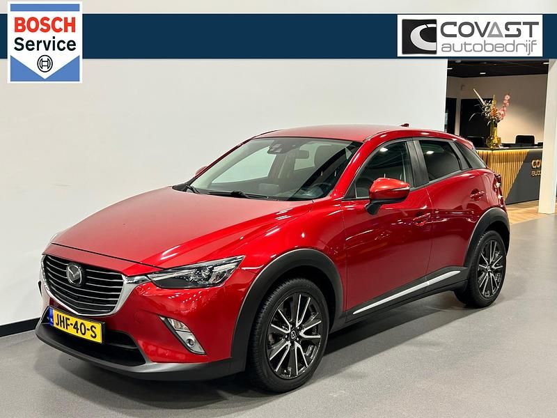 Rood (metallic) Gebruikt 2015 Mazda CX-3 SUV | € 12.950 (Iets duurder) - Afbeelding 1/4