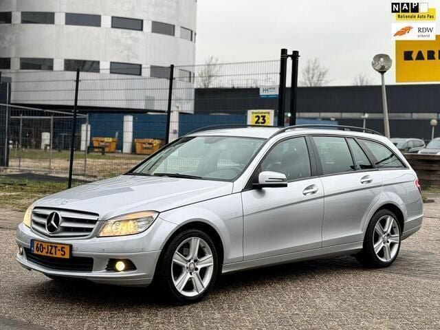 Grijs, metallic lak Gebruikt 2009 Mercedes C200 Business Stationwagen | € 3.695 (Duur) - Afbeelding 1/4