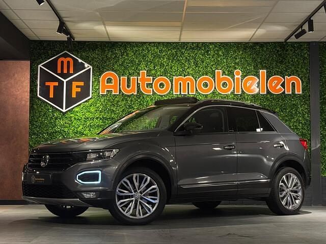 Grijs (metallic) Gebruikt 2019 VW T-Roc IQ Drive SUV | € 23.899 (Eerlijke prijs) - Afbeelding 1/4
