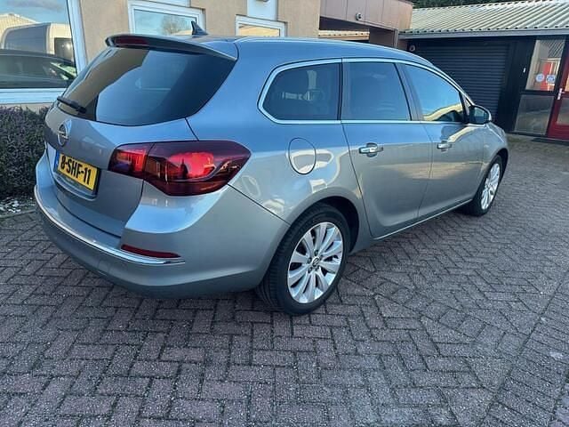Occasion Opel Astra Cosmo 120 PK (88 kW) 2013 Grijs Stationwagen