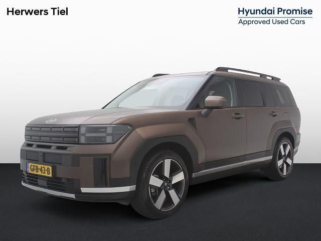 Earthy brass metallic matte (ybm) Gebruikt 2024 Hyundai Santa Fe Premium SUV | € 54.285 - Afbeelding 1/1