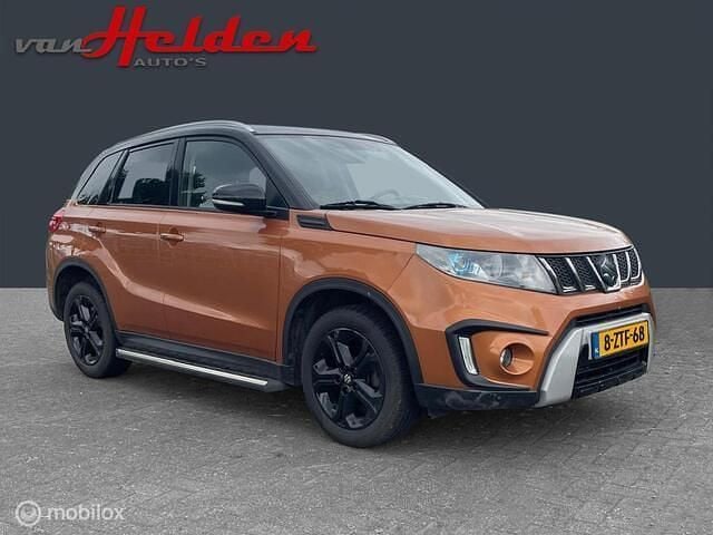 Oranje Gebruikt 2015 Suzuki Vitara SUV | € 12.900 (Goede deal) - Afbeelding 1/4