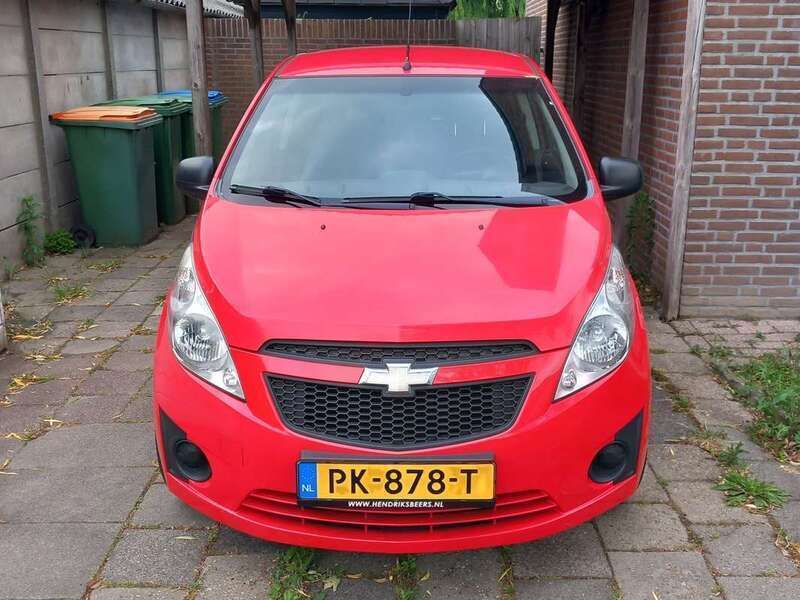 Rood Gebruikt 2011 Chevrolet Spark Hatchback | € 3.600 (Iets duurder) - Afbeelding 1/4