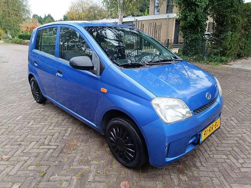 Blauw Gebruikt 2004 Daihatsu Cuore Hatchback | € 2.250 (Eerlijke prijs) - Afbeelding 1/4