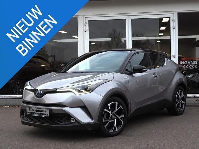Grijs Gebruikt 2018 Toyota C-HR Executive SUV | € 19.950 (Goede deal) - Afbeelding 1/4