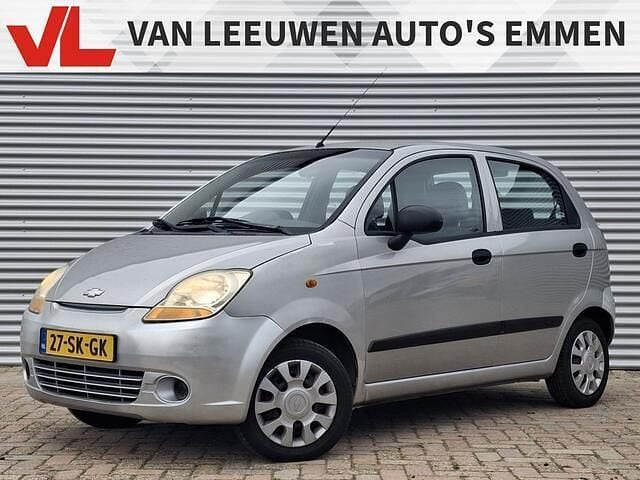 Grijs, metallic lak Gebruikt 2006 Chevrolet Matiz Hatchback | € 1.148 (Eerlijke prijs) - Afbeelding 1/4